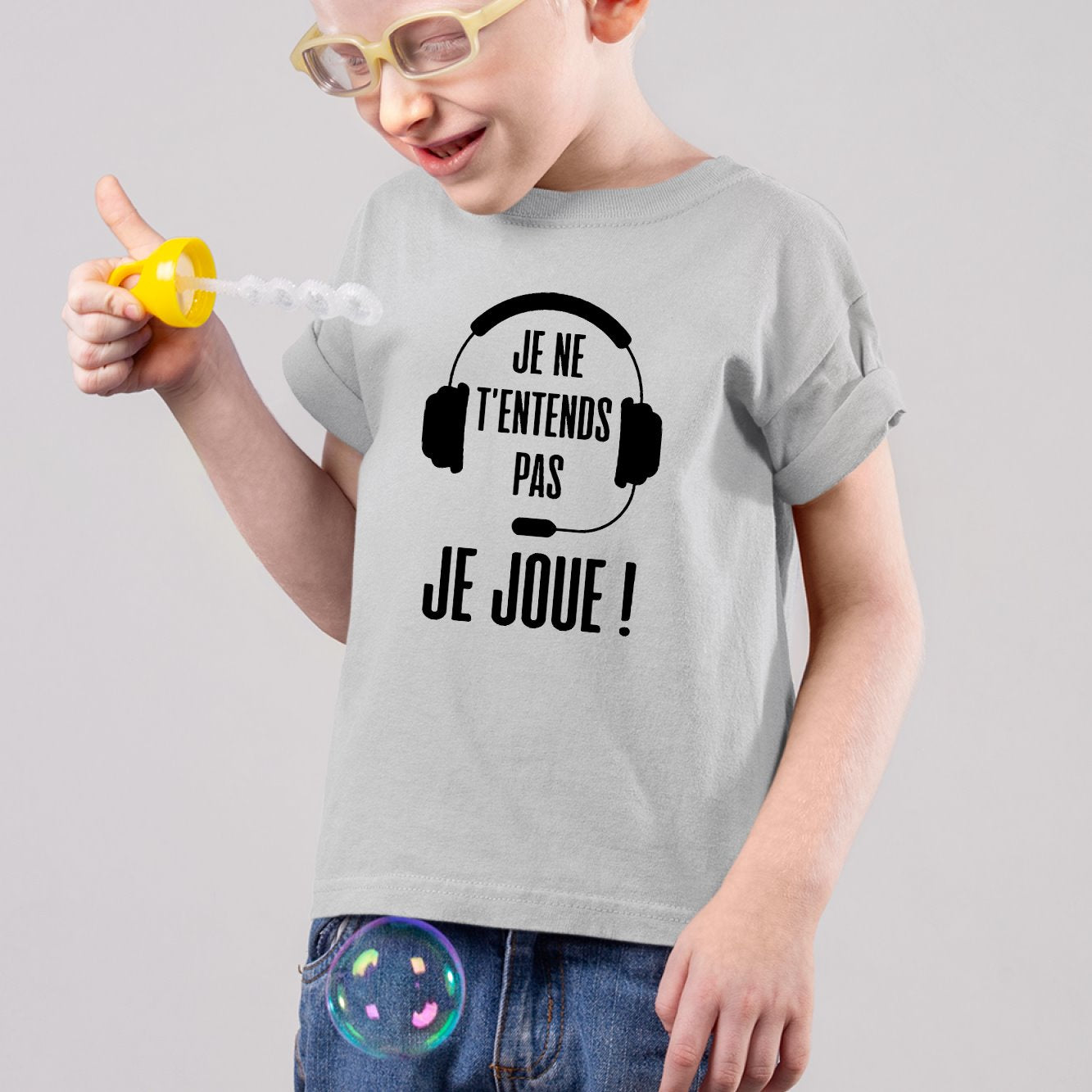 T-Shirt Enfant Je ne t'entends pas je joue Gris