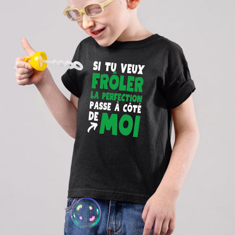 T-Shirt Enfant Si tu veux frôler la perfection passe à côté de moi Noir