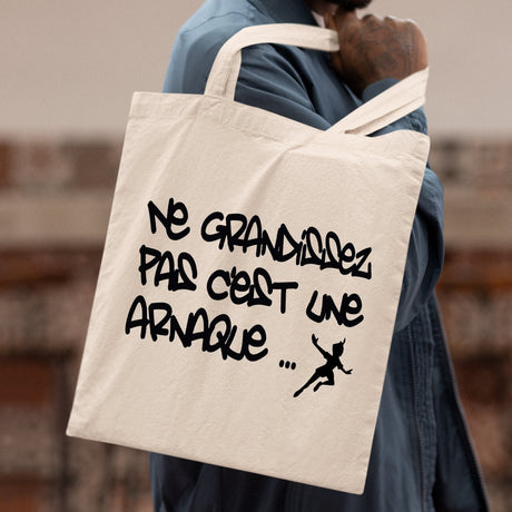 Tote bag Ne grandissez pas c'est une arnaque Beige